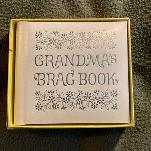 Vintage C.R. Gibson’s Grandma’s Brag Book in original box. Approx 4.5” x 4”.